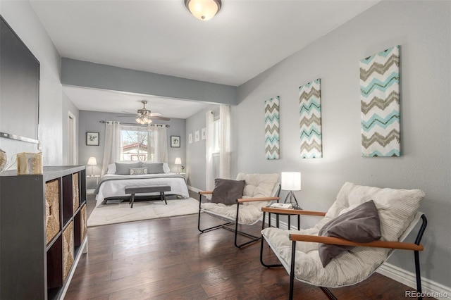3541 E 118th Ave, Thornton, CO 80233 - bedroom featuring baseboards, dark wood-style flooring, and ceiling fan