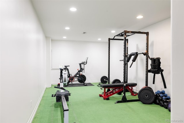 exercise room with carpet, baseboards, and recessed lighting