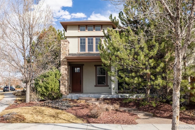 view of front of house featuring stucco siding