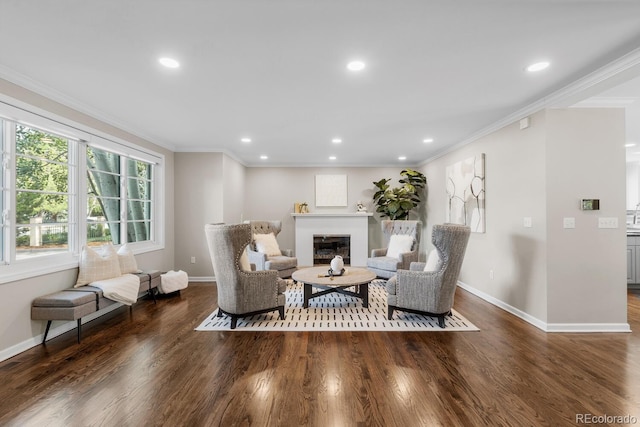 172 S Forest St, Denver, CO 80246 - living room featuring baseboards, crown molding, wood finished floors, a glass covered fireplace, and recessed lighting