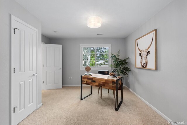 172 S Forest St, Denver, CO 80246 - home office featuring light colored carpet and baseboards