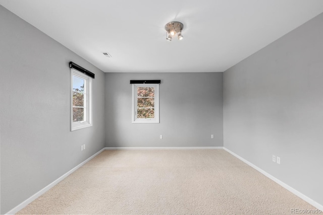 172 S Forest St, Denver, CO 80246 - empty room with baseboards and carpet floors