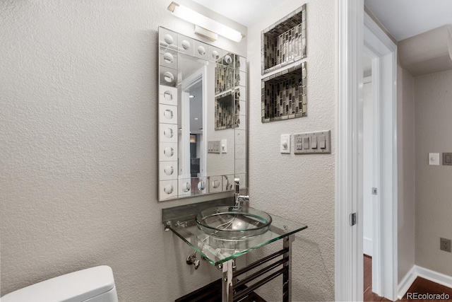172 S Forest St, Denver, CO 80246 - bathroom with a sink and toilet