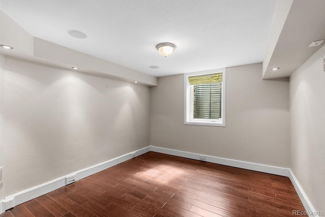172 S Forest St, Denver, CO 80246 - basement with baseboards and wood finished floors