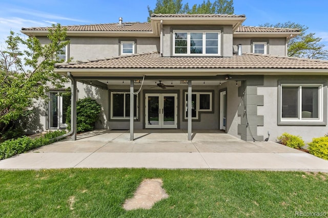 172 S Forest St, Denver, CO 80246 - back of property with stucco siding, a ceiling fan, french doors, a tile roof, and a patio area