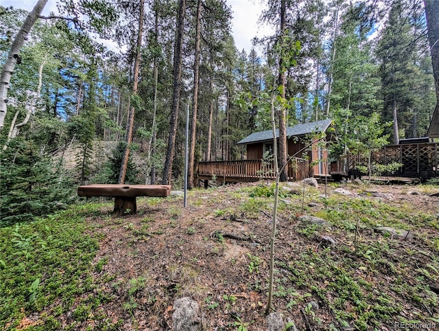 view of yard featuring a deck