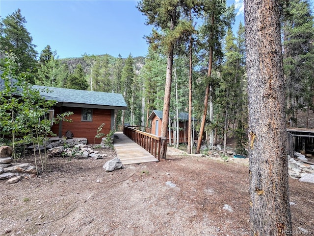 view of yard featuring a deck