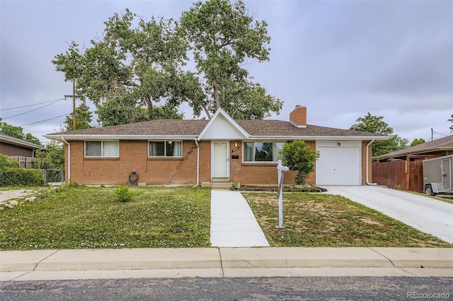 8471 Rainbow Ave, Denver, CO 80229 - ranch-style home featuring brick siding, a garage, a chimney, and driveway