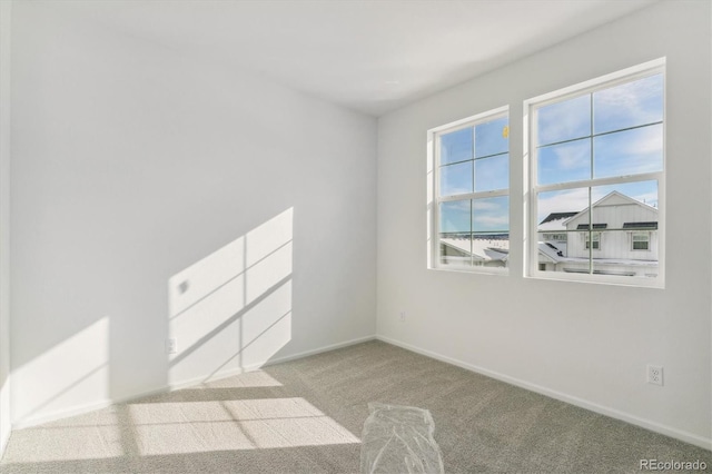 view of carpeted spare room