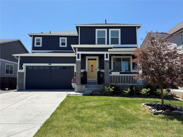 27130 E Maple Ave, Aurora, CO 80018 - view of front of home featuring covered porch, a front lawn, driveway, and an attached garage