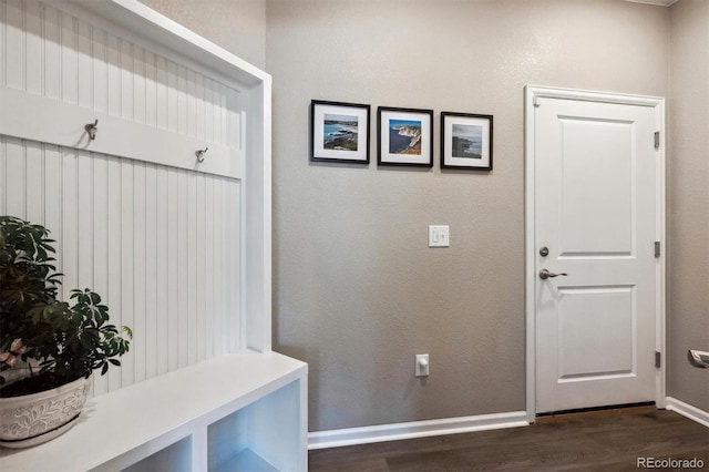 27130 E Maple Ave, Aurora, CO 80018 - mudroom featuring dark wood-type flooring and baseboards