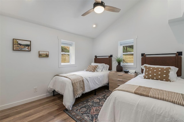 bedroom featuring ceiling fan, high vaulted ceiling, and wood-type flooring