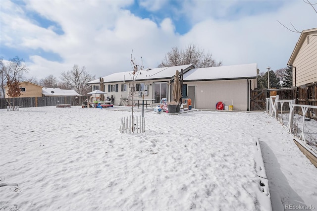 view of snow covered property