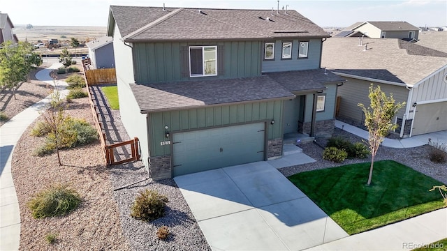 front of property with a garage