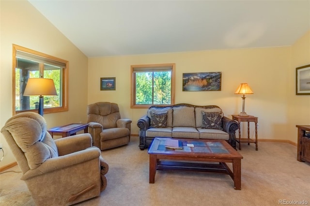 living room featuring light carpet and lofted ceiling