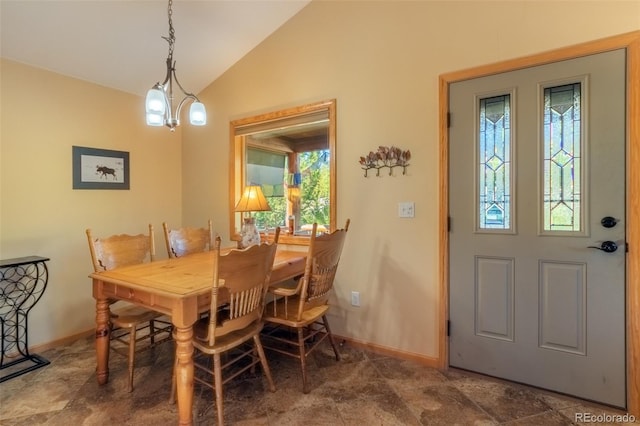 dining area with lofted ceiling