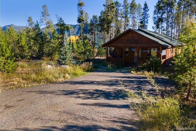 cabin featuring a mountain view