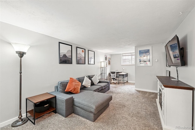 living room with light carpet and baseboards
