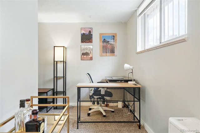 office area with baseboards and carpet flooring