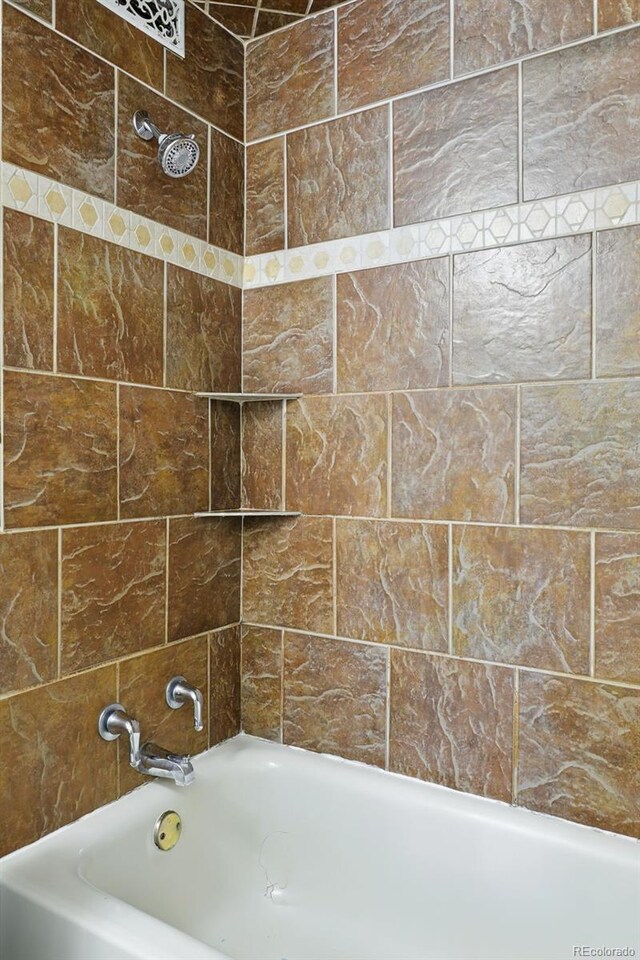 full bathroom with tub / shower combination