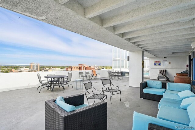 view of patio / terrace with outdoor lounge area and outdoor dining area