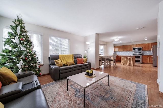 living room with light hardwood / wood-style floors