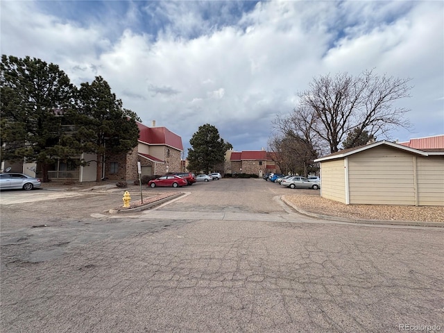 view of road featuring curbs