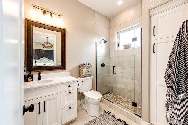 31455 Half Peak Trl, Pine, CO 80470 - full bathroom featuring a shower stall, vanity, toilet, and tile patterned floors