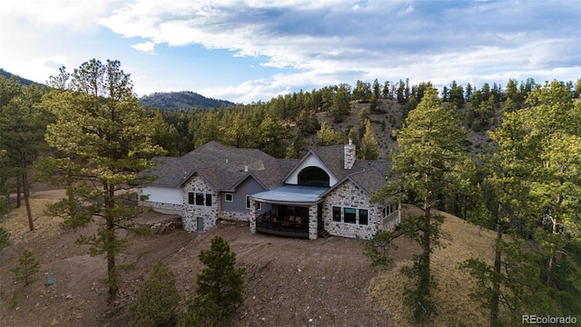 31455 Half Peak Trl, Pine, CO 80470 - view of subject property with a heavily wooded area