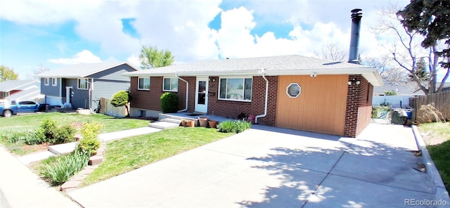 8338 Charles Way, Denver, CO 80221 - view of front of home with brick siding