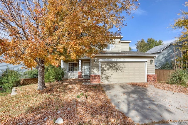 obstructed view of property with a garage