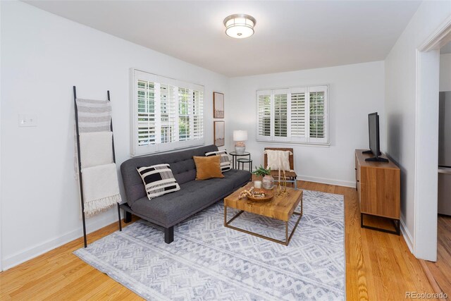 5680 W 41st Ave, Wheat Ridge, CO 80212 - living room with wood finished floors