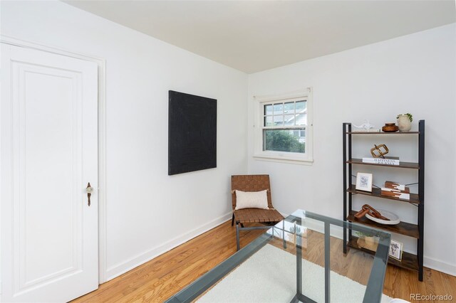 5680 W 41st Ave, Wheat Ridge, CO 80212 - sitting room featuring wood finished floors