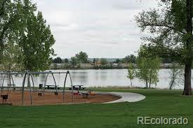 5680 W 41st Ave, Wheat Ridge, CO 80212 - view of home's community featuring a water view and a lawn