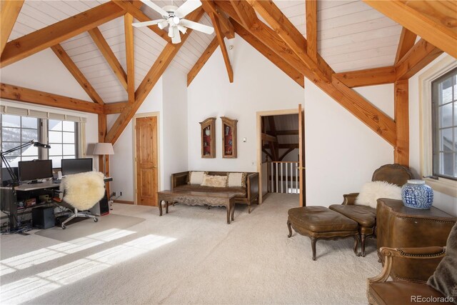 interior space featuring high vaulted ceiling, a ceiling fan, and beam ceiling