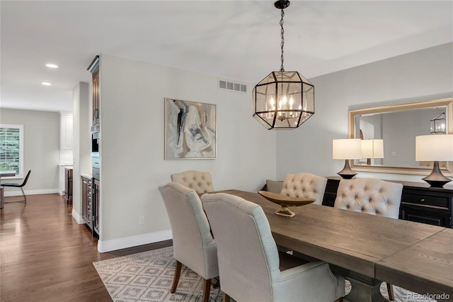 9669 E Prentice Cir, Greenwood Village, CO 80111 - dining room featuring a chandelier, baseboards, dark wood finished floors, recessed lighting, and beverage cooler