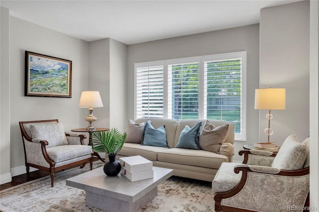 9669 E Prentice Cir, Greenwood Village, CO 80111 - living area with healthy amount of natural light, light wood-type flooring, and baseboards