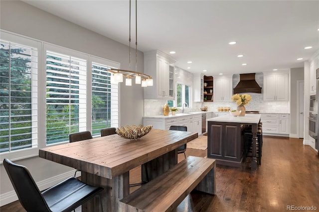 9669 E Prentice Cir, Greenwood Village, CO 80111 - dining area with dark wood finished floors and recessed lighting