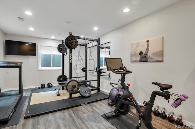 9669 E Prentice Cir, Greenwood Village, CO 80111 - exercise room featuring wood finished floors, baseboards, and recessed lighting