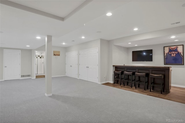 9669 E Prentice Cir, Greenwood Village, CO 80111 - finished basement featuring a bar, baseboards, recessed lighting, and carpet