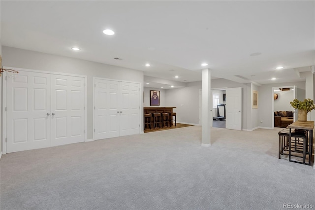 9669 E Prentice Cir, Greenwood Village, CO 80111 - finished below grade area featuring light carpet, recessed lighting, and baseboards