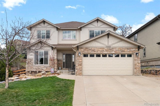craftsman-style home featuring a front yard, stone siding, roof with shingles, an attached garage, and driveway