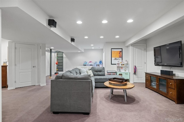 living room featuring recessed lighting and carpet flooring
