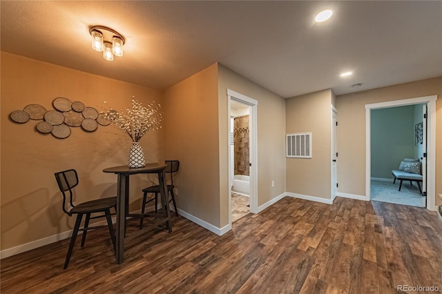 interior space with dark hardwood / wood-style flooring