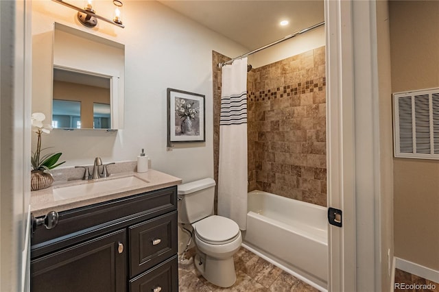 full bathroom featuring vanity, toilet, and shower / bathtub combination with curtain