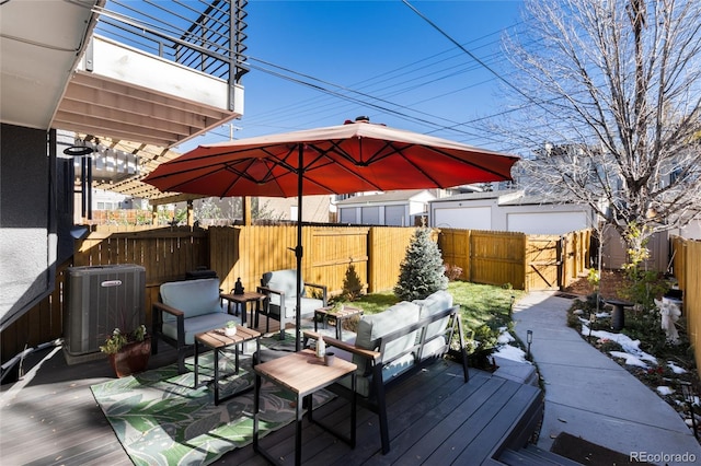 wooden deck with central air condition unit and an outdoor hangout area