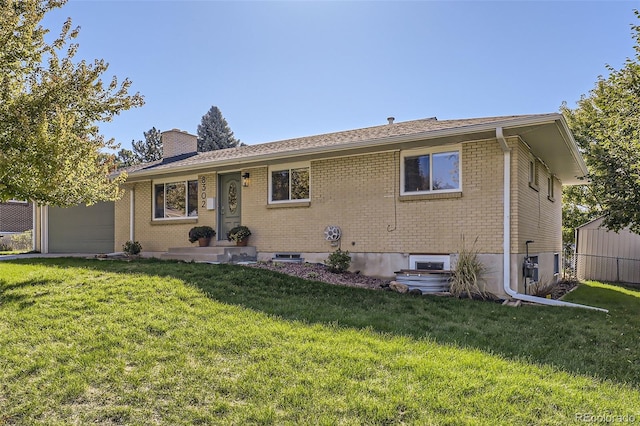 ranch-style house with a front yard