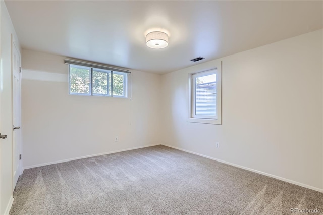 view of carpeted spare room