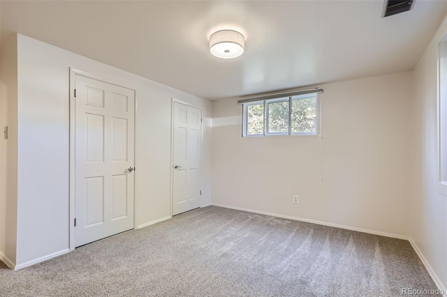 unfurnished bedroom featuring carpet floors