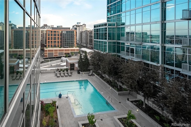 1700 Bassett St Unit 1119, Denver, CO 80202 - community pool featuring a city view and a patio